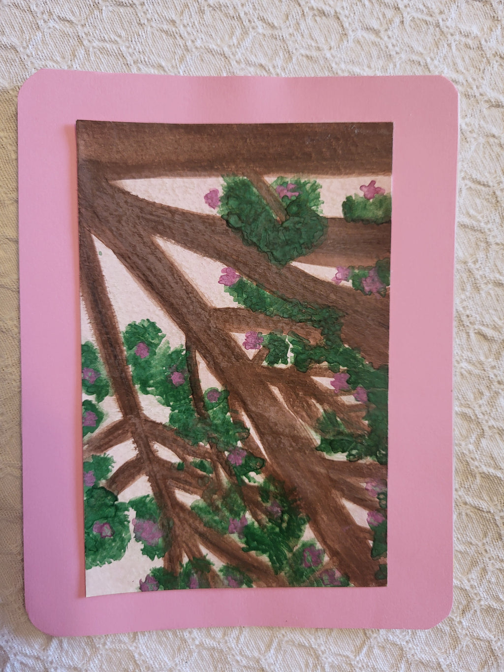 Spring watercolor of a flowering tree by We Are The Branches, showcasing vibrant blossoms and lush greenery in a delicate art style.